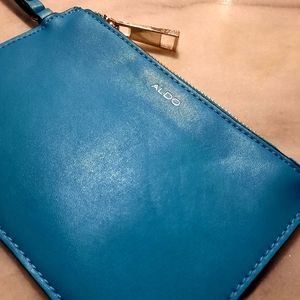 NEW , Aldo Wristlet , Blue leather Small Wristlet with Gold hardware . No tags .